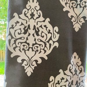 2 panels gray and white curtains